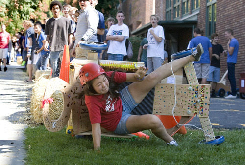Paul Fraughton | The Salt Lake Tribune
Isabel Torres, a Rowland Hall sophomore, loses control of her team's gravity car as she attempts to make the turn at the bottom of the hay bale lined course. The cars, built by the students earlier in the day, were part of a science lesson dealing with potential and kinetic energy. The event was part of the school's 