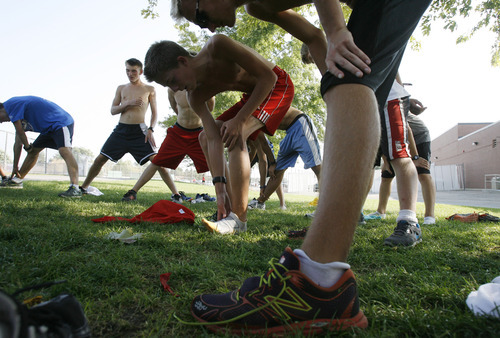 Francisco Kjolseth  |  The Salt Lake Tribune
American Fork is one of the top cross country programs in the state as the team recently cools following a team work out before the start of the cross country season under coach Timo Mostert.