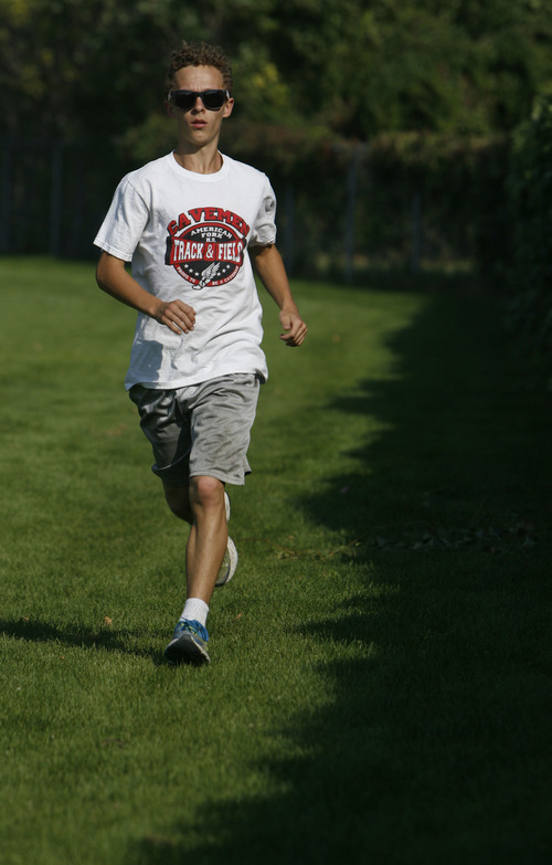 Francisco Kjolseth  |  The Salt Lake Tribune
American Fork is one of the top cross country programs in the state and Tyson Green is one of the team members in the front of the pack as he cools down following a team practice recently.