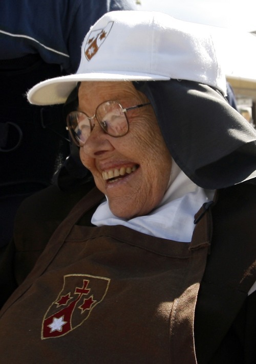 Tribune file photo
Extern Sister Mary Joseph greeted the crowds during the 55th annual Carmelite Fair in Holladay several years ago.