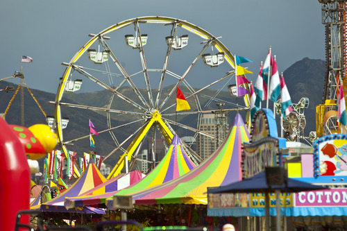 Chris Detrick  |  The Salt Lake Tribune
The Thomas Carnival Century Wheel rises above the midway at the Utah State Fair.  Sunday, Sept. 16, is the last day of the fair.