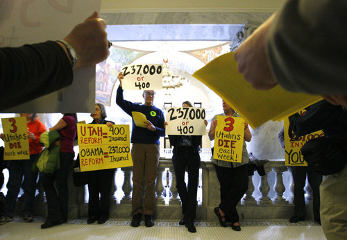 Photo by Leah Hogsten  |  The Salt Lake Tribune
Above, Ted Gurney of SLC (center) joined other Medicare and Medicaid insured citizens fighting against cuts. Disabled Rights Action Committee and the Anti Hunger Action Committee held a rally outside the Senate floor at the Utah Capitol Tuesday, February 23, 2010 to protest Senator J. Stuart Adams' sponsorship of HB 67. 
 SLC 2/23/10