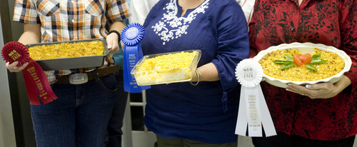 Kim Raff | The Salt Lake Tribune
The winners in the Funeral Potato Contest at the Utah State Fair include (from left): Gina Varni, second, Laurie Willberg, first, and Nancy Judd, third.