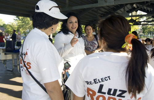 Kim Raff | The Salt Lake Tribune
State Sen. Luz Robles, D-Salt Lake City, talks to volunteers during a Latino voter outreach event in Riverside Park in Salt Lake City. Democrats know they have an advantage over Republicans with Latino voters and point to the signal sent by having nine Latino Democratic candidates for legislative seats compared to just one for the GOP.