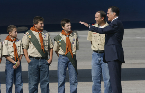 Francisco Kjolseth  |  The Salt Lake Tribune
Republican presidential candidate Mitt Romney meets with Salt Lake Boy Scout troop 315 as he arrives in Utah for a pair of fundraisers on Tuesday, September 18, 2012, in what is expected to be his last stop in the state before the November election.