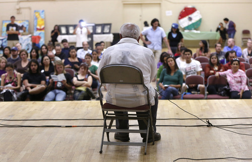 Jim Urquhart/Special to the Salt Lake Tribune 
Archie Archuleta reads from the book Yo Soy Joaquin as part of the 50 states in preserving Mexican American culture and defending freedom of speech Friday, September 21, 2012, at the Centro De Civico Mexicano in Salt Lake City. The event is a nation-wide cultural celebration in opposition to Arizona's HB 2281, the law used to eliminate the Mexican American Studies Programs in the Tucson Unified School District earlier this year.