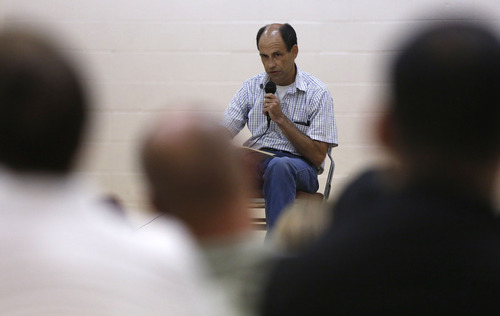 Jim Urquhart/Special to the Salt Lake Tribune 
Mark Alvarez reads from the book Savage Inequalities as part of the 50 states in preserving Mexican American culture and defending freedom of speech Friday, September 21, 2012, at the Centro De Civico Mexicano in Salt Lake City. The event is a nation-wide cultural celebration in opposition to Arizona's HB 2281, the law used to eliminate the Mexican American Studies Programs in the Tucson Unified School District earlier this year.