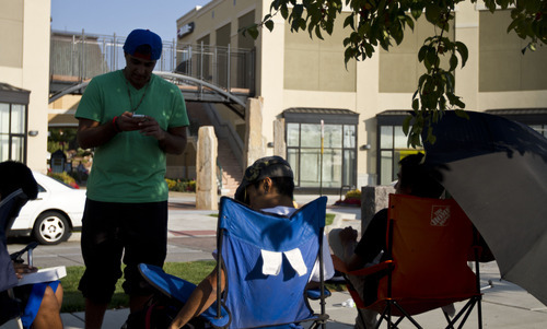 Lennie Mahler  |  The Salt Lake Tribune
Chance Lameman, the first in line, and others wait at the Gateway Mall for the new iPhone 5 on Thursday, Sept. 20, 2012. The doors to the Apple Store open Friday, Sept. 21, at 7:30 a.m.