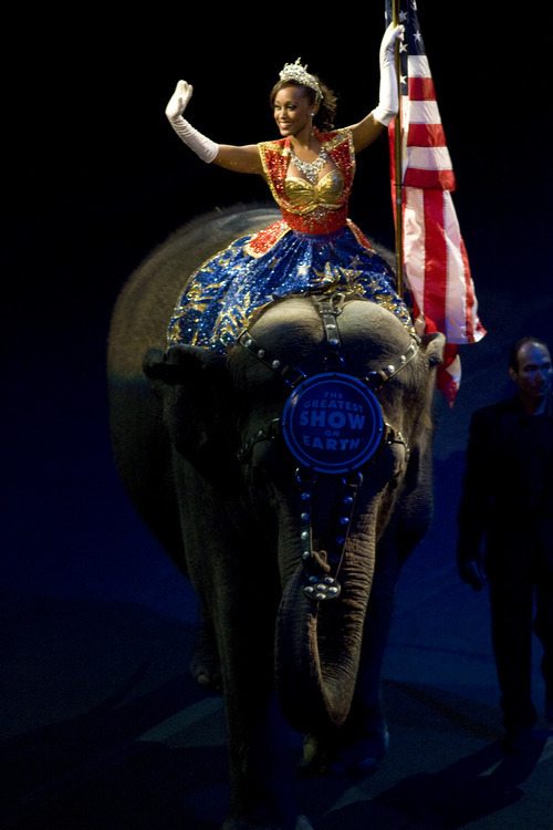 Kim Raff | The Salt Lake Tribune
A women rides on top of an elephant during the National Anthem on opening night of the Ringling Bros. Barnum & Bailey Circus show Dragons at the Energy Solutions Arena in Salt Lake City on Sept. 20, 2012.