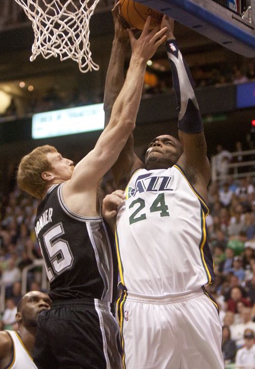 Jeremy Harmon  |  The Salt Lake Tribune

Paul Millsap is fouled by Matt Bonner as the Jazz host the Spurs in the first round of the NBA playoffs at EnergySolutions Arena in Salt Lake City, Saturday, May 5, 2012.