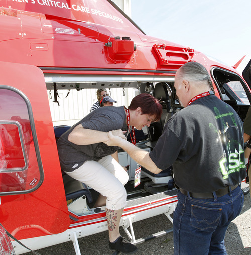 Al Hartmann  |  The Salt Lake Tribune  
Jenni and Ken Vitrano of Kaysville get a look at the treatment area during  a recent VIP tour of one of the new Life Flight Agusta Grand helicopters that Intermountain Medical Center has purchased. They are able to fly at 200 miles per hour.