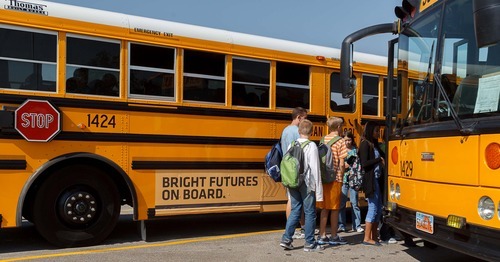 Trent Nelson  |  The Salt Lake Tribune
Advertisements on school buses at Sunset Ridge Middle School in West Jordan, Utah, Friday, September 21, 2012.
