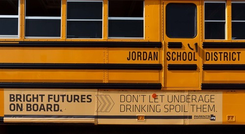 Trent Nelson  |  The Salt Lake Tribune
Advertisements on school buses at Sunset Ridge Middle School in West Jordan, Utah, Friday, September 21, 2012.