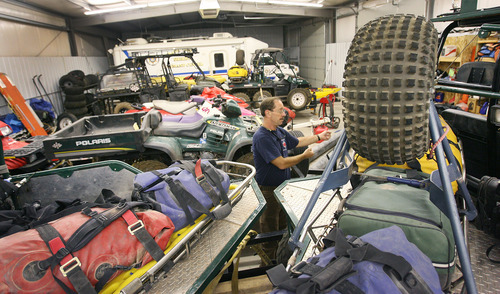 Steve Griffin | The Salt Lake Tribune


Grand County Search and Rescue commander, Jim Webster, stands in a sea of rescue equipment used by his department in Moab, Utah Thursday September 13, 2012. Grand and Wayne counties are charging people for search and rescues. One man received a $1,500 bill for being rescued after his raft overturned on the Colorado River. A North Carolina man received a $4,000 bill after he rescued from Bluejohn Canyon.