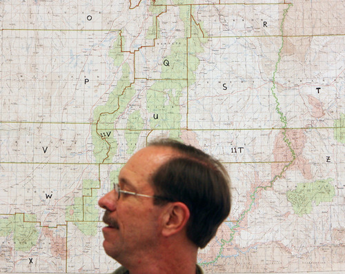 Steve Griffin | The Salt Lake Tribune


Grand County Search and Rescue commander, Jim Webster, stands in front of a map of Utah at the search and rescue offices in Moab, Utah Thursday September 13, 2012. Grand and Wayne counties are charging people for search and rescues. One man received a $1,500 bill for being rescued after his raft overturned on the Colorado River. A North Carolina man received a $4,000 bill after he rescued from Bluejohn Canyon.