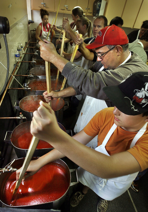 Scott Sommerdorf  |  Salt Lake Tribune
Volunteers prepare tomato sauce at Our Lady of Lourdes Catholic Church in Magna in 2009. This year's 78th annual church fund-raiser will raise funds for a new church roof, as well as community outreach programs.