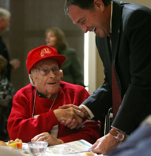 Steve Griffin  |  The Salt Lake Tribune
Decked out in his Ute gear, 102-year-old Otis Curtis, of South Jordan, chats with Gov. Gary R. Herbert during the 26th Annual Centenarians Day Celebration at Noah's Reception Center in South Jordan, Friday September 28, 2012.