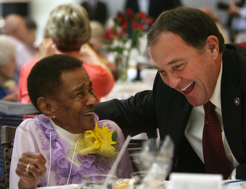 Steve Griffin  |  The Salt Lake Tribune
102-year-old Velma Saunders laughs with Gov. Gary R. Herbert Friday after telling him she was voting for him during the 26th Annual Centenarians Day Celebration at Noah's Reception Center in South Jordan.