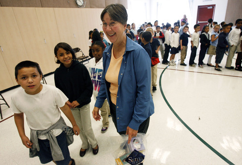 Francisco Kjolseth  |  The Salt Lake Tribune
Third-grade teacher Cindy Shields was one of 20 teachers at Salt Lake City's Riley Elementary School who got a boost on Thursday, September 27, 2012, when they are presented gift cards from Sam's Club to help them finance classroom supplies. Riley Elementary is a low-income, high minority school that struggles with a student population where 90 percent have free and reduced lunch and more than half are non-native English speaking students. A school assembly was organized to celebrate the donation. As every Sam's club across the country picked a school in their area to present a similar donation.
