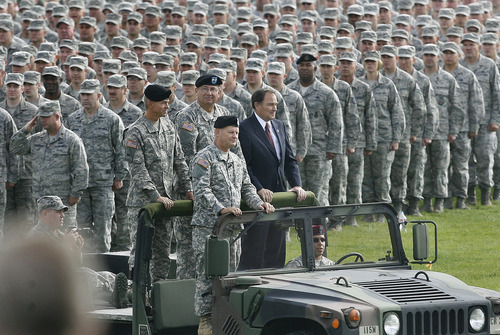 Scott Sommerdorf  |  The Salt Lake Tribune             
Utah Gov. Gary Herbert, right, commander in chief of the Utah National Guard, reviewed his troops in a pass-and-review ceremony with  Gen. Michael Liechty, front left, Maj. Gen. Jefferson S. Burton, back left, and Maj. Gen. Brian L. Tarbet, Saturday, September 29, 2012.
