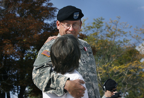 Scott Sommerdorf  |  The Salt Lake Tribune             
Maj. Gen. Brian L. Tarbet embraces his wife, Mary, after ceremony Saturday marking his 12 years as the adjutant general of the Utah National Guard. Tarbet relinquished command to Maj. Gen. Jefferson S. Burton at a ceremony on the field named for Tarbet.