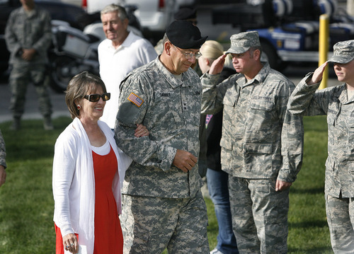 Scott Sommerdorf  |  The Salt Lake Tribune             
Maj Gen. Brian L. Tarbet arrives with his wife, Mary. After 12 years as adjutant general of the Utah National Guard,  Tarbet relinquished command to Maj. Gen. Jefferson S. Burton at a ceremony on the field named for Tarbet, Saturday, September 29, 2012.