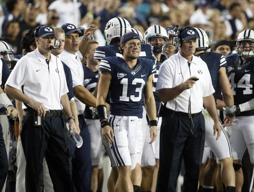 Chris Detrick  |  The Salt Lake Tribune
BYU head coach Bronco Mendenhall and quarterback Riley Nelson watch during the game against Hawaii at LaVell Edwards Stadium in Provo on Friday, Sept. 28, 2012.