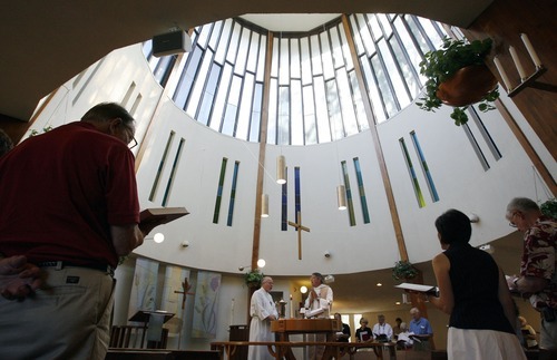 Steve Griffin  |  The Salt Lake Tribune
Rev. Jeffrey D. Louden, right, leads the congregation at  Mt. Tabor Lutheran Church in 2010.