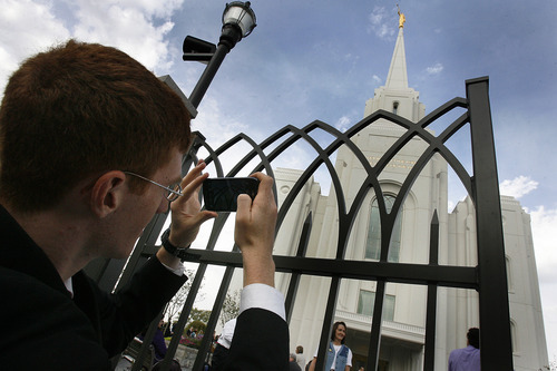 Scott Sommerdorf  |  The Salt Lake Tribune             
Edward Pingel of Tremonton makes a photograph the new temple in Brigham City after it was dedicated, at 250 S. Main St., Sunday, Sept. 23, 2012.