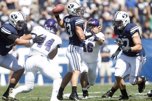 Chris Detrick  |  The Salt Lake Tribune
BYU quarterback Riley Nelson throws the ball against Weber State at LaVell Edwards Stadium in Provo on Sept. 8, 2012.