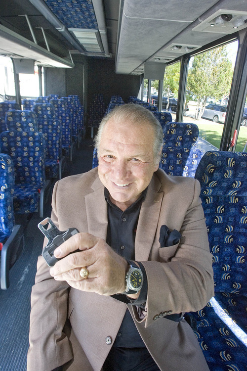 Paul Fraughton | Salt Lake Tribune
Richard Bizzaro, CEO of All Resort Group. Inc, prepares to buckle up in one of  the company's buses. THe company has invested more than $2million to equip its newest fleet of buses with  lap belts and three point  seat belts.

 Tuesday, October 2, 2012
