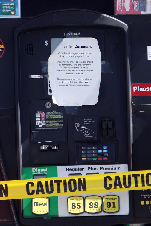 Steve Griffin | The Salt Lake Tribune

Gas pumps at the Conoco station near 4700 South and 3600 West has caution tape and a note on them in West Valley City on Sept. 28, 2012.  About 15 service stations in Utah have 