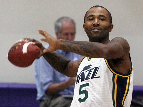 Steve Griffin | The Salt Lake Tribune


New Jazz guard Mo Williams throws a football during Jazz media day in Salt Lake City on Oct. 1, 2012.