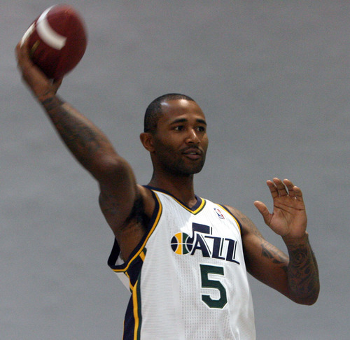 Steve Griffin | The Salt Lake Tribune


New Jazz guard Mo Williams throws a football during Jazz media day in Salt Lake City on Oct. 1, 2012.