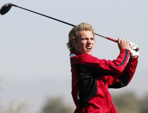 Al Hartmann  |  The Salt Lake Tribune
First day leader Austin Banz of West High School watches his drive on the final round of the 5A  Boys Golf High School State Championship at River Bend Golf Course in  Riverton.