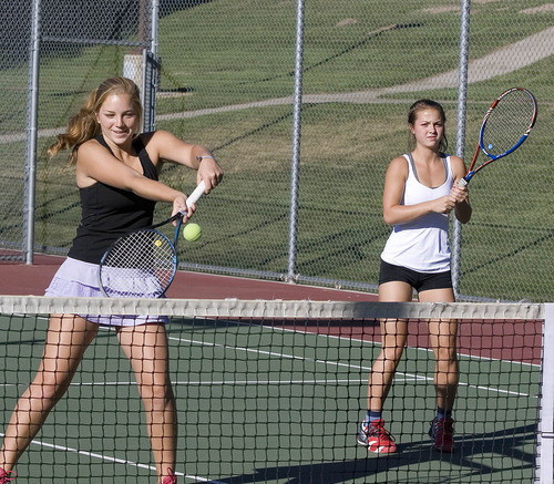Paul Fraughton  |  Salt Lake Tribune
The #2 girls doubles team at Olympus High Emily Watts , left, and Hannah Durham  get ready for the upcoming state tournament.