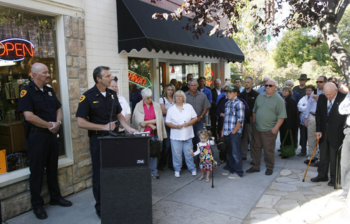 Francisco Kjolseth  |  The Salt Lake Tribune
Salt Lake City Police Lt. Mike Ross talks about the fateful night that led to the death of Officer Percy Clark 39 years ago at a pharmacy in the Avenues, now known as the Avenues Bistro on Third. The Salt Lake Police Department gathered at 564 E. Third Ave. in Salt Lake City on Thursday, October 4, 2012, to dedicate a plaque Clark, killed during an armed robbery in 1973.