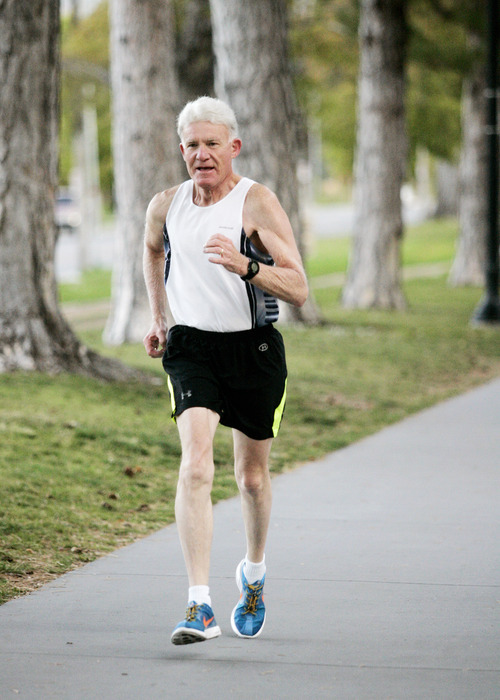 Ashley Detrick  |  The Salt Lake Tribune
Jim Michie, 74, runs one of his last training runs around Liberty Park on Wednesday, Oct. 3, 2012, in preparation for the St. George Marathon this weekend. His three mile run around the park was at his marathon pace of 9:09, which will put him finishing right around 4 hours.
This marathon will be Michie's  50th since he started running 34 years ago.