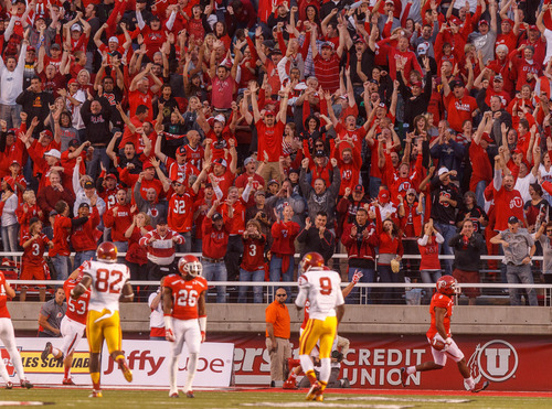 Trent Nelson  |  The Salt Lake Tribune
Utah fans cheer as Utah defensive end Nate Fakahafua (8) scores the first touchdown of the game on a first-quarter USC turnover Oct. 4, 2012 at Rice-Eccles Stadium in Salt Lake City.