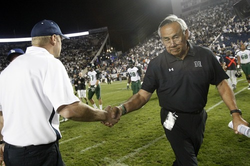 Chris Detrick  |  The Salt Lake Tribune
Brigham Young Cougars head coach Bronco Mendenhall and Hawaii Warriors head coach Norm Chow shake hands after the game at LaVell Edwards Stadium Friday September 28, 2012. BYU won the game 47-0.