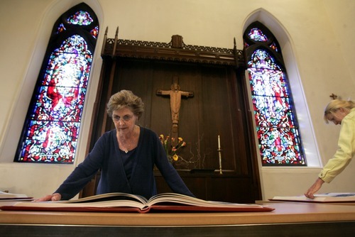 Kim Raff | The Salt Lake Tribune
Diane Gooch looks through the Wisdom Books of the reproduction of the St. John's Bible on display at the Cathedral Church of St. Mark in Salt Lake City on Oct. 3, 2012. 