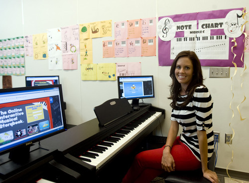 Kim Raff | The Salt Lake Tribune
Cassie Olsen-Taylor is the school's program coordinator for the U Play Piano program, an interactive program featuring stories and games that helps students learn to play the piano at Washington Elementary School in Salt Lake City.