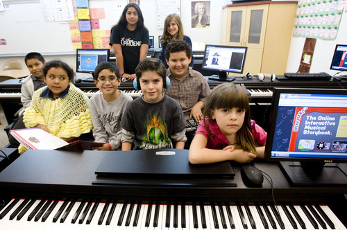 Kim Raff | The Salt Lake Tribune
This group of students use UPlay Piano, an interactive program featuring stories and games that helps students learn to play the piano at Washington Elementary School.