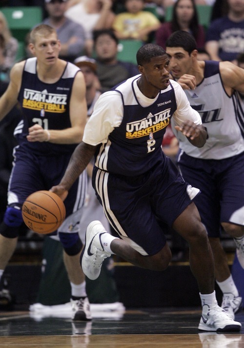 Kim Raff | The Salt Lake Tribune
Marvin Williams dribbles down court during the Jazz Scrimmage at EnergySolutions Arena in Salt Lake City, Utah on October 6, 2012.