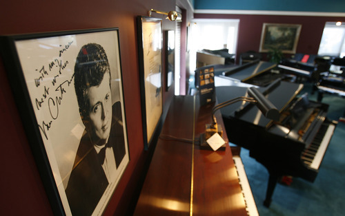 Scott Sommerdorf  |  The Salt Lake Tribune             
The walls of Daynes Music Company in Midvale are full of portraits and posters signed by famous pianists, Monday, October 1, 2012. The store will be celebrating the store's 150th anniversary.