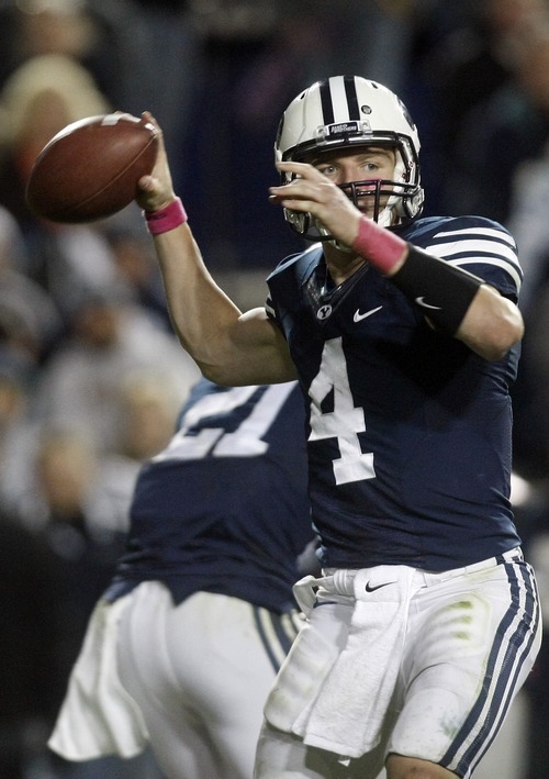 Chris Detrick  |  The Salt Lake Tribune
Brigham Young Cougars quarterback Taysom Hill (4) throws the ball during the second half of the game at LaVell Edwards Stadium Friday October 5, 2012. BYU won the game 6-3.