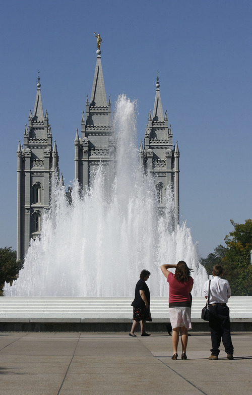 Scott Sommerdorf  |  The Salt Lake Tribune             
People make photos in Temple Square prior to the afternoon session of the 182nd Semiannual General Conference, Saturday, October 6, 2012.