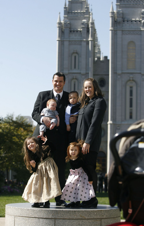 Scott Sommerdorf  |  The Salt Lake Tribune             
The Miler family from South Jordan has their photo taken in Temple Square before the start of the afternoon session of the 182nd Semiannual General Conference, Saturday, October 6, 2012.