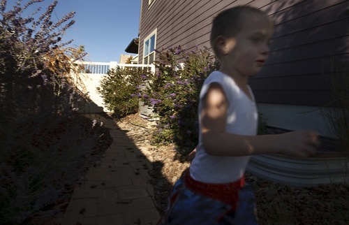 Leah Hogsten  |  The Salt Lake Tribune
Hagen Dickinson, 4, who suffers from moderate to severe autism, needs constant supervision when he plays outside to ensure his safety and that he does not escape from the yard.