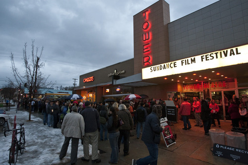 Chris Detrick  |  The Salt Lake Tribune
Filmgoers wait outside of Tower Theatre in Salt Lake City before the screening of 